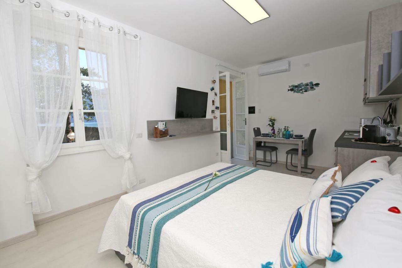 Apartment A Lago Private Beach And Parking Oliveto Lario Exterior photo